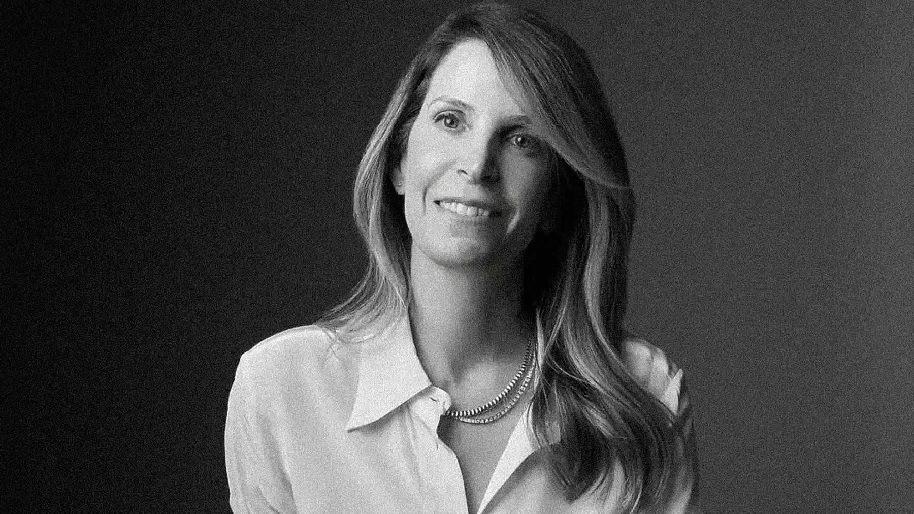 Independent consultant in a tailored blazer photographed for consultant headshots in Miami
