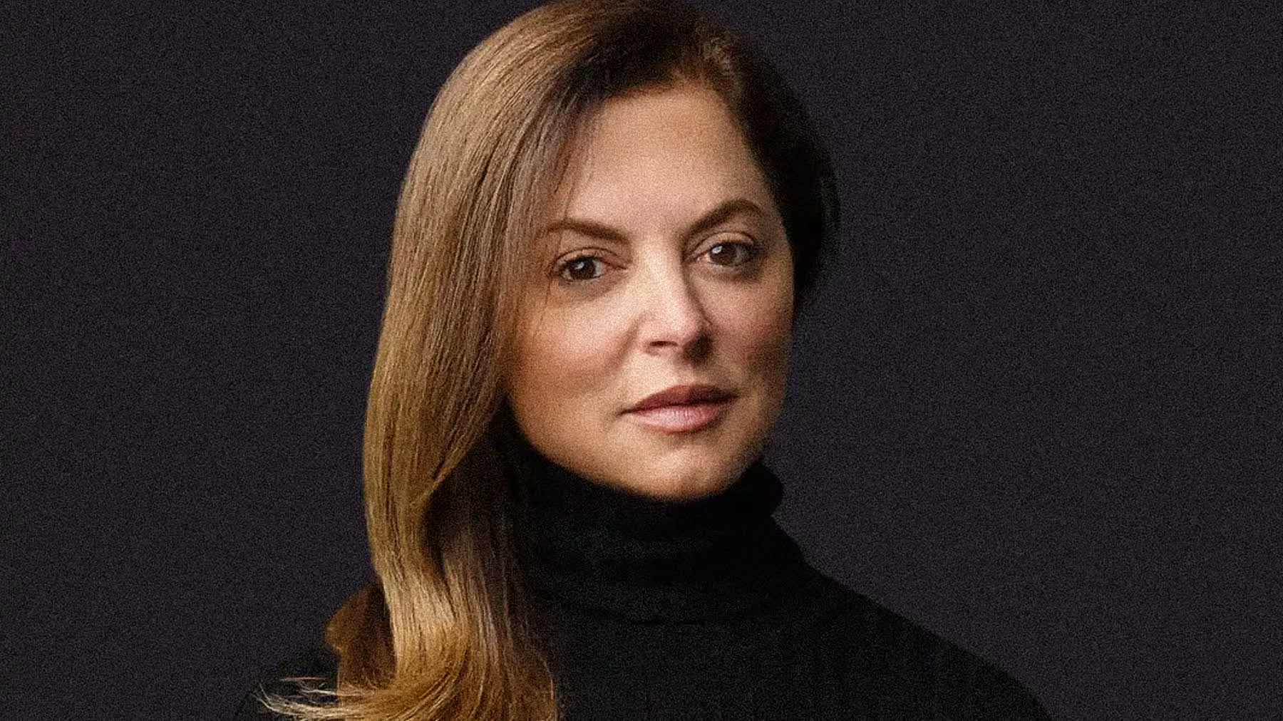 Content creator photographed for personal brand headshots in a Miami studio