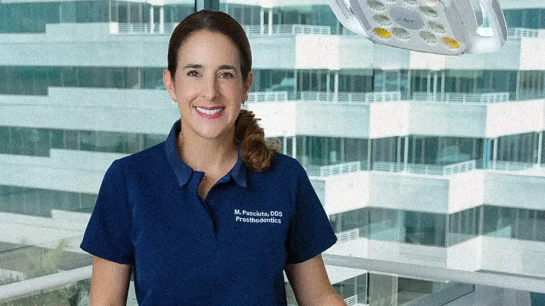 Physician photographed for fellowship application headshots in a Miami studio