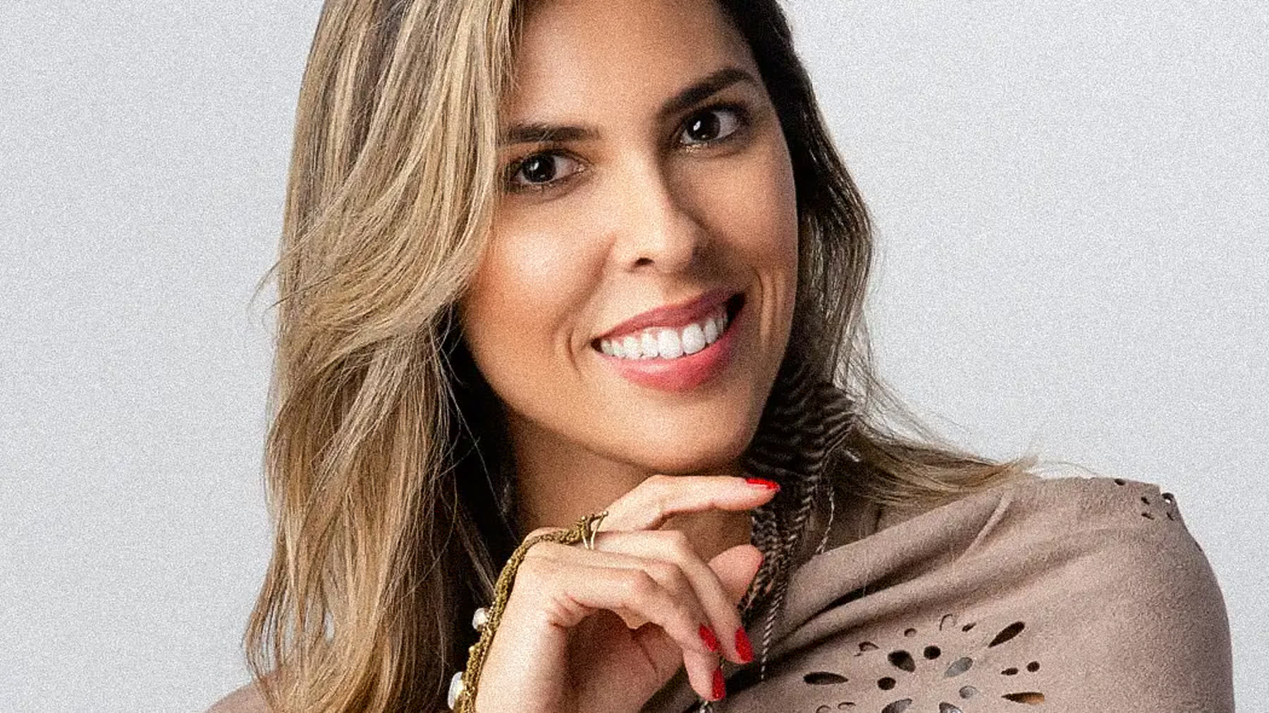 Podcast host photographed for headshots in a Miami studio