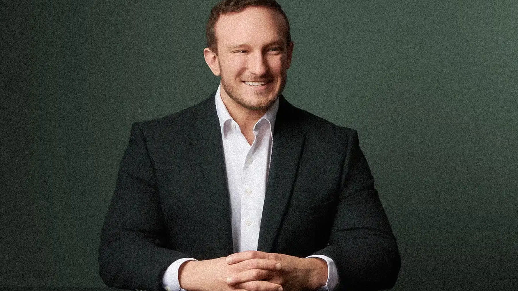 Professional preparing for a headshot session at a Downtown Miami studio