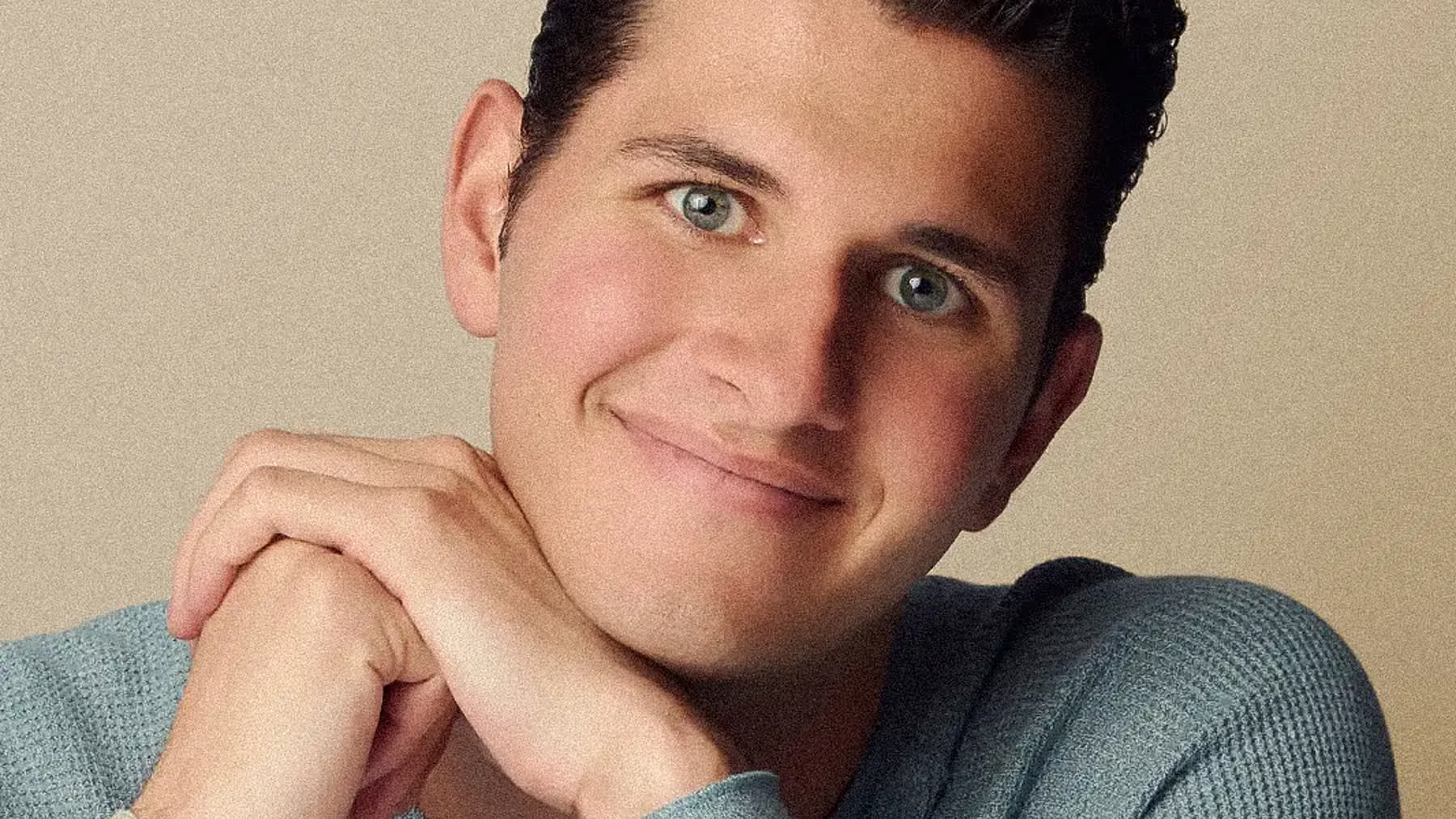 Professor photographed for academic headshots in a Miami studio