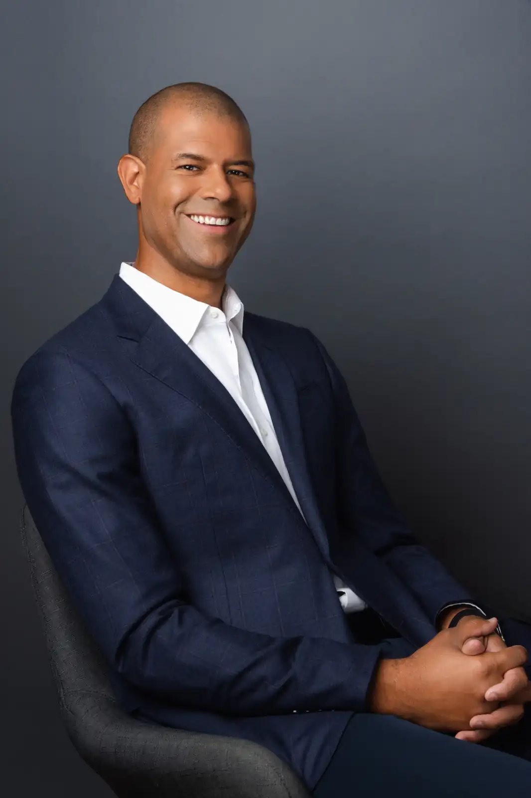 Corporate headshot - bearded businessman in navy blue suit