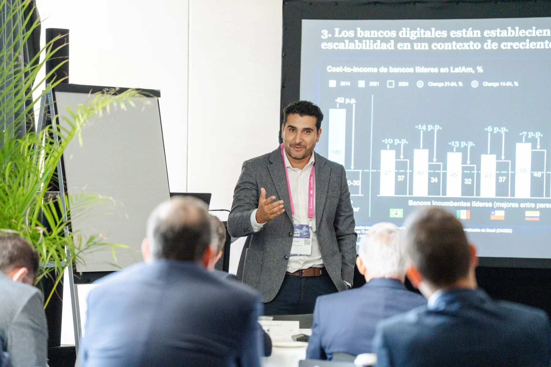 Breakout speaker presenting to a seated corporate audience